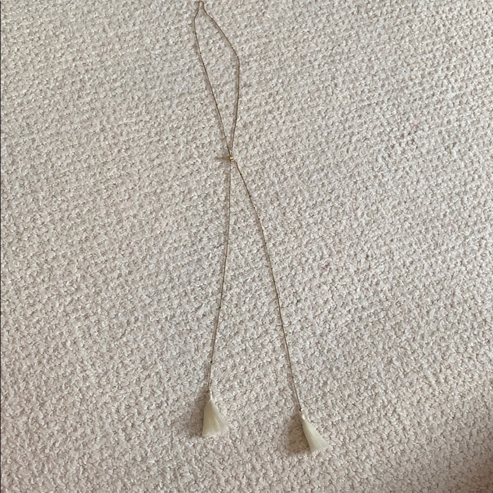 a gold tassels adjustable necklace